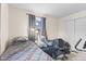 Bedroom featuring twin beds, soft natural light from the window, and closet at 2539 S Edgewood Cv, Martinsville, IN 46151