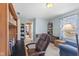 Cozy bedroom features warm colors and built-in bookshelves at 2539 S Edgewood Cv, Martinsville, IN 46151