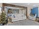 Inviting living area with wooden beams, stylish decor, and a comfortable couch with blue pillows at 2539 S Edgewood Cv, Martinsville, IN 46151