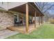 Inviting covered patio with ample seating and a cozy atmosphere, perfect for relaxing outdoors at 2539 S Edgewood Cv, Martinsville, IN 46151
