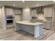 Spacious kitchen with stainless steel appliances, granite countertops, and a large center island at 2634 Penn Ave, Plainfield, IN 46168