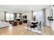 Open-concept living room seamlessly flows into the dining area, great for entertaining at 2634 Penn Ave, Plainfield, IN 46168