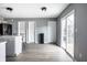 Bright kitchen featuring island, modern appliances, and plenty of cabinet space at 305 Beacon Point Ln, Fortville, IN 46040