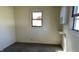 Bedroom with neutral walls, carpet, a window and a small amount of storage at 318 Chester St, Anderson, IN 46012