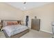 Comfortable bedroom featuring a large bed and walk-in closet at 3240 Wildlife Trl, Zionsville, IN 46077