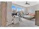 Bright bedroom with a home office area and large windows at 3240 Wildlife Trl, Zionsville, IN 46077