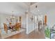 Dining area with hardwood floors, traditional furnishings, and easy access to other living areas at 3240 Wildlife Trl, Zionsville, IN 46077