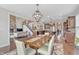 Open-concept dining room offering seamless flow to the kitchen and living areas, perfect for entertaining at 3240 Wildlife Trl, Zionsville, IN 46077