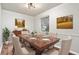 Traditional dining room features wood table with upholstered chairs, complemented by elegant decor and natural light at 3445 N Olney St, Indianapolis, IN 46218