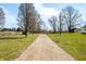 Gravel driveway leading to property at 3721 S 575 W, Trafalgar, IN 46181