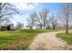 Exterior with long driveway, barn and house at 3721 S 575 W, Trafalgar, IN 46181