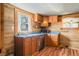 Kitchen area with wood cabinets and stainless steel dishwasher at 3721 S 575 W, Trafalgar, IN 46181