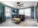 Comfortable living room with lots of natural light, and stylish leather sofa at 3926 Rookwood Ave, Indianapolis, IN 46208