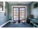 Relaxing sunroom with seating, lots of natural light, and view of the outdoors at 3926 Rookwood Ave, Indianapolis, IN 46208