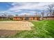 Large backyard featuring a patio and green grass at 3929 Lee St, Anderson, IN 46011