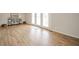 Spacious living room with wood floor and French doors leading to the exterior at 3929 Lee St, Anderson, IN 46011