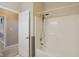 Bathroom featuring a shower/tub combo, neutral wall color, and doorway to another room at 400 S Prairie Trce, Muncie, IN 47304