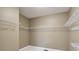 Walk-in closet featuring ample storage space with wire shelving, neutral colors and overhead lighting at 400 S Prairie Trce, Muncie, IN 47304