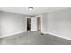 A carpeted bedroom featuring closet space at 412 N Riley Ave, Indianapolis, IN 46201