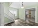 Foyer features a staircase and leads to the kitchen at 412 N Riley Ave, Indianapolis, IN 46201