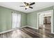 Bright living room with hardwood floors and natural light at 412 N Riley Ave, Indianapolis, IN 46201