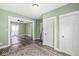 Spacious living room featuring an open floorplan and hardwood floors at 412 N Riley Ave, Indianapolis, IN 46201