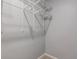 An empty closet with metal shelving, offering efficient storage space at 503 Lockerbie N Cir, Indianapolis, IN 46202