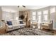 Spacious living room with hardwood floors, contemporary decor, and lots of natural light at 503 Lockerbie N Cir, Indianapolis, IN 46202
