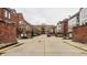 Charming street showcasing residential buildings and tree-lined sidewalks at 503 Lockerbie N Cir, Indianapolis, IN 46202