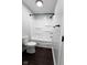 Bathroom featuring a toilet and shower with dark wood floors at 511 Windward Ln, Plainfield, IN 46168