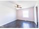 Bright bedroom featuring wood floors and a large window at 511 Windward Ln, Plainfield, IN 46168