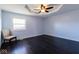 Spacious bedroom featuring wood floors, a ceiling fan, and a chair at 511 Windward Ln, Plainfield, IN 46168