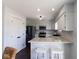 Updated kitchen with white cabinetry, subway tile backsplash, and stainless steel appliances at 511 Windward Ln, Plainfield, IN 46168