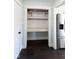 Well-organized walk-in pantry offering ample storage space with built-in shelving at 511 Windward Ln, Plainfield, IN 46168