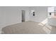 Bedroom featuring neutral carpet and white walls with a door at 5207 Rolling Meadow Blvd, Indianapolis, IN 46237