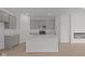 Open-concept kitchen island, stainless appliances, and modern finishes at 5207 Rolling Meadow Blvd, Indianapolis, IN 46237