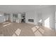 Open concept living space with kitchen, fireplace and lots of natural light at 5207 Rolling Meadow Blvd, Indianapolis, IN 46237