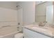 Bathroom with granite vanity and white fixtures, offering a clean design at 5565 Noble Dr, Indianapolis, IN 46234