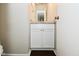 Bathroom featuring granite vanity top and sleek white storage at 5565 Noble Dr, Indianapolis, IN 46234