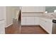 Kitchen features granite countertops, stainless steel appliances, and white cabinets at 5565 Noble Dr, Indianapolis, IN 46234