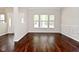 Spacious living room with light-colored walls, durable flooring, and ample natural light at 5565 Noble Dr, Indianapolis, IN 46234