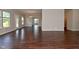 Open living area with a glass door leading to the outdoors, providing great sunlight at 5565 Noble Dr, Indianapolis, IN 46234