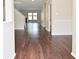 Inviting living room featuring durable, modern flooring and neutral wall colors at 5565 Noble Dr, Indianapolis, IN 46234