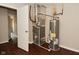 Modern utility room featuring updated furnace and water heater at 5565 Noble Dr, Indianapolis, IN 46234