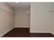 Walk-in closet with wire shelving and dark wood-look floors at 5565 Noble Dr, Indianapolis, IN 46234