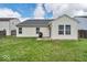 Well-maintained backyard with green grass and a patio area, perfect for outdoor entertaining and relaxing at 714 Breakers Ln, Fortville, IN 46040