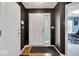 Welcoming entryway with dark walls, and a light-colored door at 714 Breakers Ln, Fortville, IN 46040