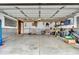 Wide garage featuring ample space, storage solutions, and well-organized tools and equipment at 714 Breakers Ln, Fortville, IN 46040