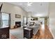 Open living room featuring high ceilings, lots of seating, and a fireplace at 714 Breakers Ln, Fortville, IN 46040