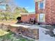 Backyard patio with brick design and an outdoor fireplace at 7180 N State Road 42, Eminence, IN 46125